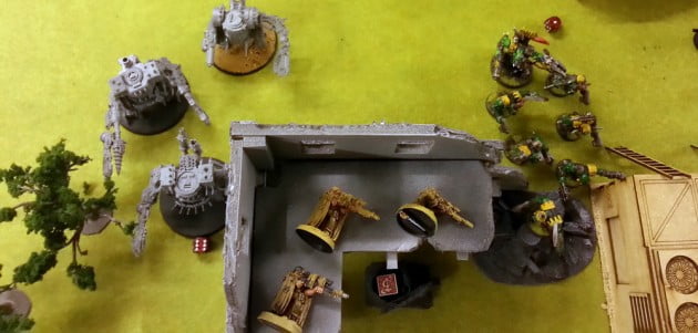 The Warboss and his squad of Nobs sprang through a gap in a wall